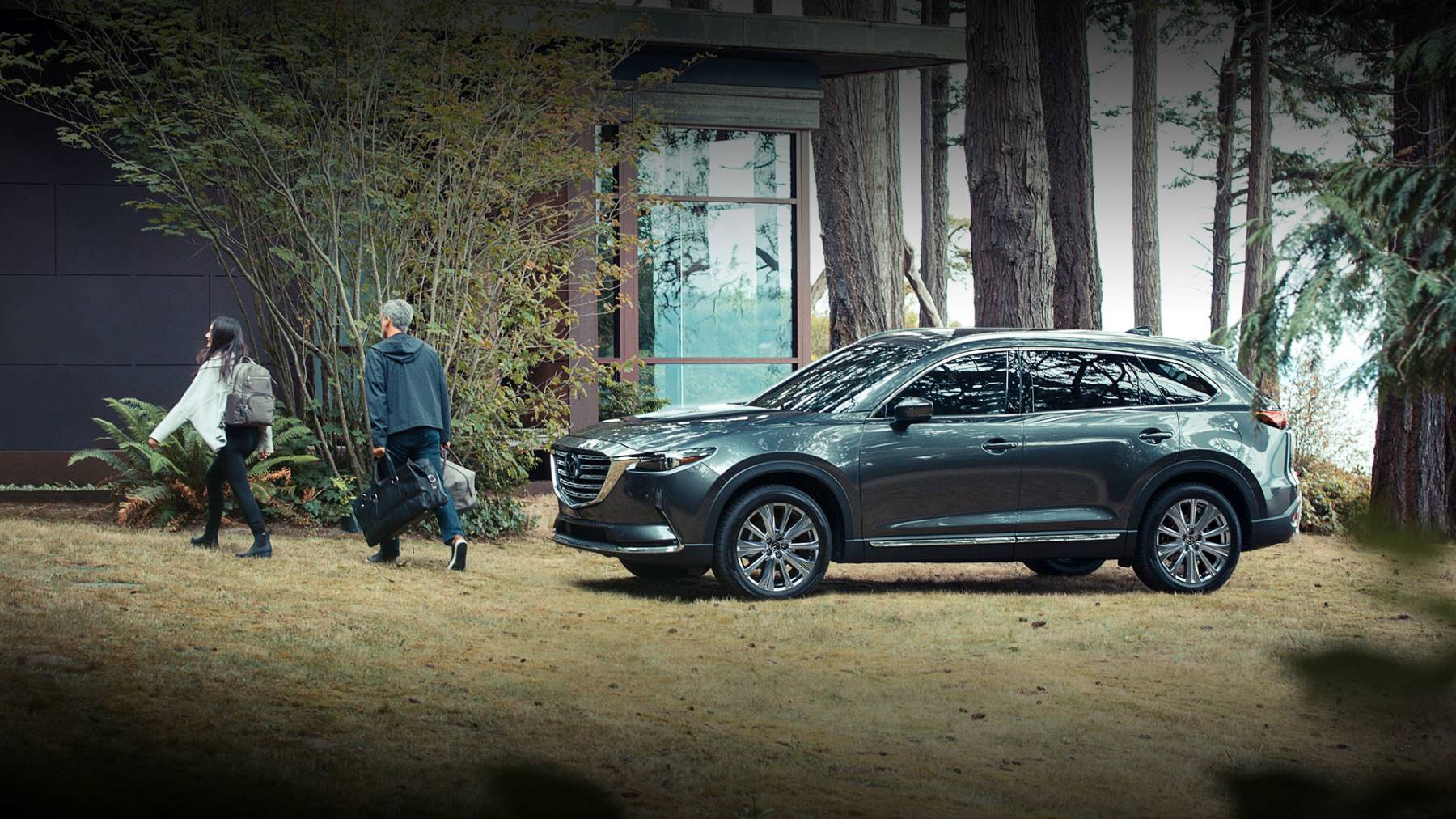 2023 Mazda CX-9 with a family exiting