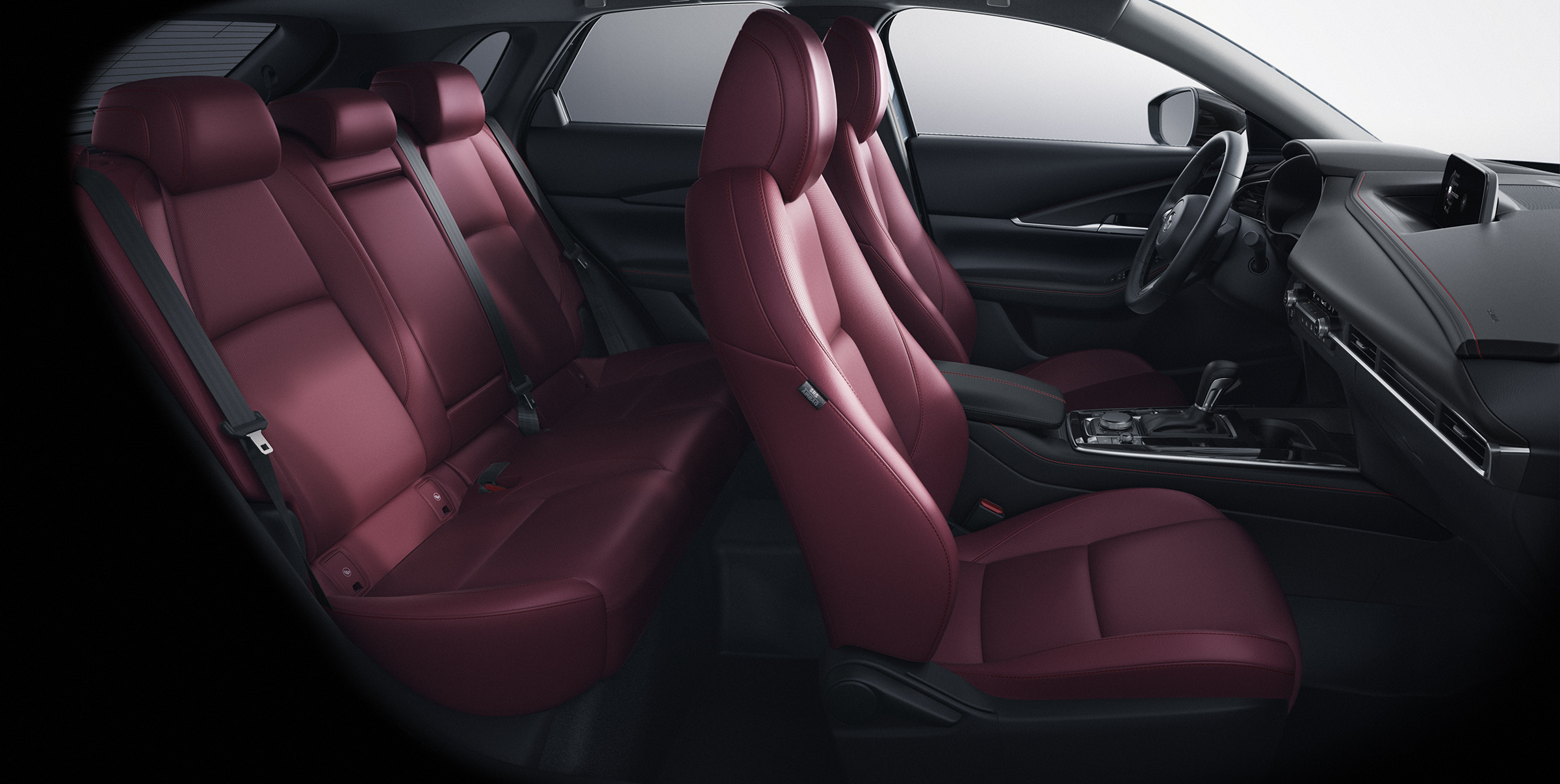 Red interior seating of the 2026 Mazda CX-30